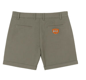 Back view of khaki CITY SHORT with welt pockets and signature red patch